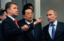 (L-R) Gazprom CEO Miller, China's President Hu and Russia's PM Putin (Reuters)