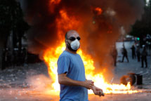 Protestor in Athens (Reuters/John Kolesidis)