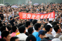 Protests in Dalian, August 14 (Reuters)