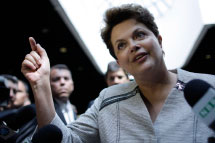 Brazil's President Dilma Rousseff speaks to reporters(Reuters/Ueslei Marcelino)