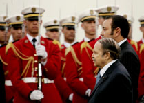 Algeria's President Abdelaziz Bouteflika (L) and Morocco's King Mohammed VI at Algiers Airport(Reuters/Zohra Bensemra)