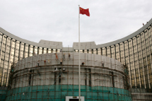 Workers carry out renovation work at the headquarters of the central bank of China in Beijing.(REUTERS/Grace Liang)