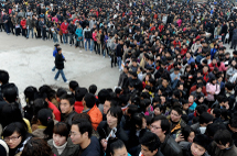 Thousands of job-seekers flock to a job fair in Hefei, China. (REUTERS/Jianan Yu)