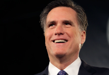 Republican presidential candidate and former Massachusetts Governor  Mitt Romney smiles during a South Carolina Republican party presidential debate  (REUTERS/John Adkisson)