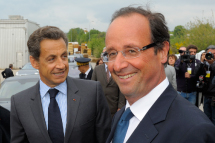 France's President Nicolas Sarkozy and Socialist Party presidential  candidate hopeful Francois Hollande visit a wood sawmill in centeral France. (REUTERS/Philippe Wojazer)
