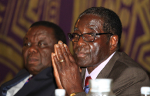 Zimbabwe's President Mugabe and Prime Minister Tsvangirai  (REUTERS/Philimon Bulawayo)