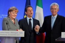  German Chancellor Angela Merkel, French President Nicolas Sarkozy and Italian Prime Minister Mario Monti. (REUTERS/Michel Euler)

