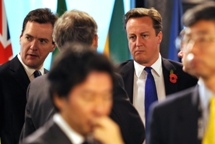 UK Chancellor of the Exchequer George Osbourne and Prime Minister David Cameron. (REUTERS/Dylan Martinez)