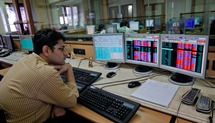 A broker monitors prices at a firm in Mumbai. (REUTERS/Danish Siddiqui)