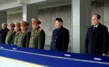 North Korea's new leader Kim Jong-un looks on during memorial for Kim Jong-il in Pyongyang. (REUTERS/KCNA)