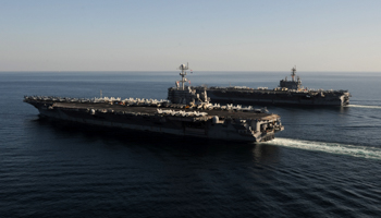 Aircraft carriers in the Strait of Hormuz. (REUTERS/Handout)