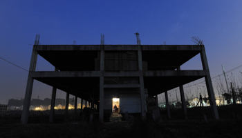 An unfinished residential building in Hefei, Anhui province. (REUTERS/Jianan Yu)