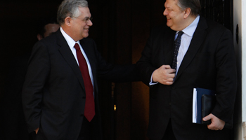 Greek Prime Minister Lucas Papademos and Finance Minister Evangelos Venizelos after a meeting in Athens. (REUTERS/John Kolesidis)