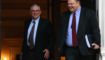 Greek Prime Minister Lucas Papademos and Finance Minister Evangelos Venizelos. (REUTERS/John Kolesidis)