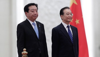 Japan's Prime Minister Yoshihiko Noda and China's Premier Wen Jiabao. (REUTERS/Jason Lee)