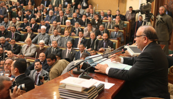 Mohamed Saad al-Katatni of the Muslim Brotherhood speaks to other members of Egypt's parliament. (REUTERS/Khaled Elfiq/Pool)