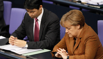 Chancellor Merkel and Economy Minister Philipp Roesler in the Bundestag. (REUTERS/Tobias Schwarz)
