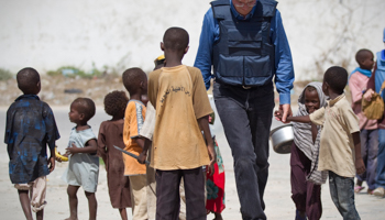 UK International Development Secretary Andrew Mitchell in Somalia. (REUTERS/POOL New)