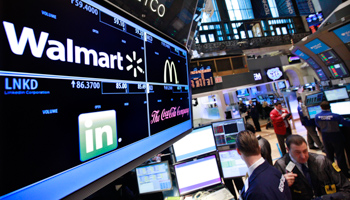 A board shows stock prices for Walmart, Linkedin, McDonald's and Coca-Cola at the New York Stock Exchange. (REUTERS/Brendan McDermid)