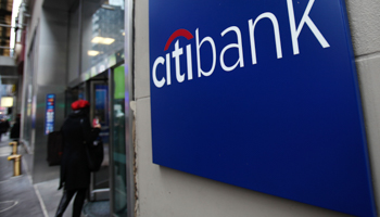 A woman walks into a Citibank branch in New York. (REUTERS/Shannon Stapleton)