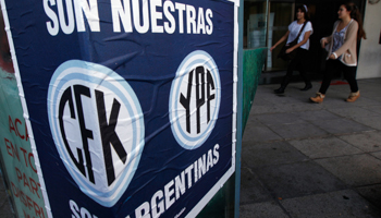 A poster in Buenos Aires in support of the government's expropriation of YPF. (REUTERS/Marcos Brindicci)