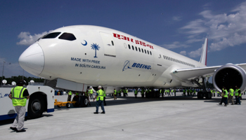 A new Boeing 787 passenger jet is rolled out in North Charleston, South Carolina. (REUTERS/Mary Chastain)