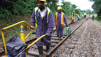 Labourers rebuild a railway outside Monrovia, Liberia. (REUTERS/Reuters Staff)