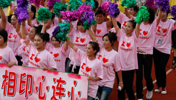 Foxconn employees take part in a "Treasure Your Life" rally. (REUTERS/Bobby Yip)