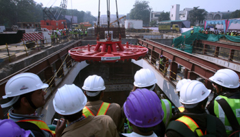 A tunnel boring machine is lowered at a construction site of the Delhi Metro. (REUTERS/Parivartan Sharma)