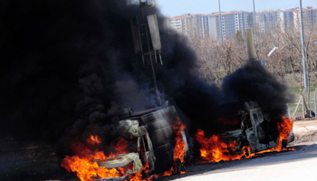 Mobile telephone relay stations are set on fire by pro-Kurdish demonstrators in Diyarbakir, southeastern Turkey, in March. (REUTERS/Stringer Turkey)