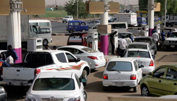 People queue at a petrol station in Khartoum after the government detailed measures to phase out fuel subsidies. (REUTERS/Stringer)