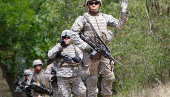 US army soldiers take part in Filipino-US joint military exercises inside a Philippine army camp. (REUTERS/Romeo Ranoco)