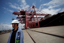 Container ship at Ningbo, China (REUTERS/Carlos Barria)