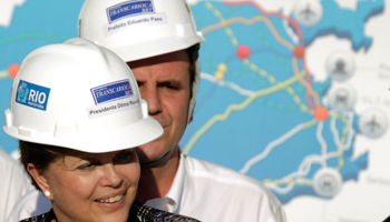 President Rousseff and Rio de Janeiro's Mayor Eduardo Paes visit the new Transcarioca highway. (REUTERS/Ricardo Moraes)