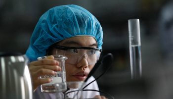 An employee works at a laboratory of a Kraft Foods factory in Suzhou. (REUTERS/Aly Song)