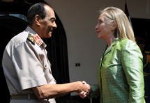 Egyptian military chief Field Marshal Mohamed Tantawi shakes hand with U.S. Secretary of State Clinton. (REUTERS/Handout)