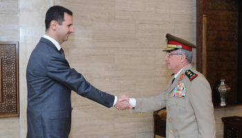 President Assad welcomes new Chief of General Staff Ali Abdullah Ayyoub (REUTERS/Sana)