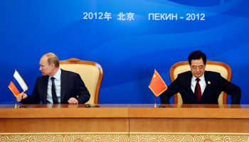 China's President Hu Jintao and Russia's President Vladimir Putin during a signing ceremony in Beijing (REUTERS/POOL New)