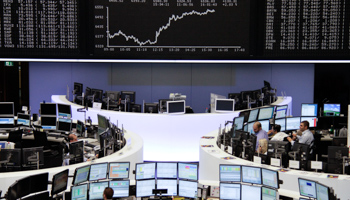 Traders work at the Frankfurt stock exchange (REUTERS/Wolfgang Rattay)