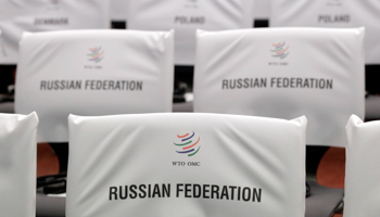 Seats for delegates before the ceremony marking Russia's accession to the WTO in Geneva (REUTERS/Denis Balibouse)