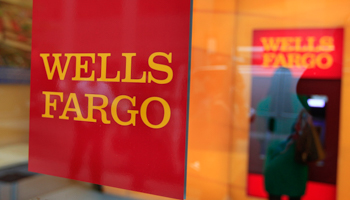 A Wells Fargo sign outside a banking branch (REUTERS/Shannon Stapleton)