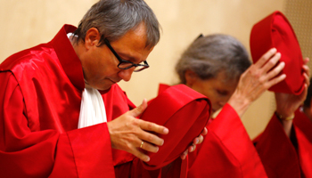 Constitutional Court judges prepare to deliver their ruling (REUTERS/Kai Pfaffenbach)