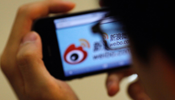 A man visits the Weibo microblogging site (REUTERS/Carlos Barria)