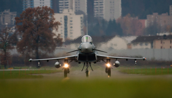 A EADS Eurofighter Typhoon jet rolls along the taxiway in Emmen (REUTERS/Michael Buholzer)
