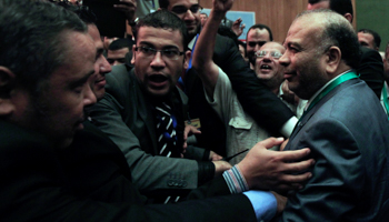 Saad al-Katatni reacts with the crowd after he was chosen as the new chairman of the FJP (REUTERS/Mohamed Abd El Ghany)