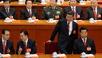 Xi Jinping takes his seat at the opening ceremony of the CCP National Congress (REUTERS/Jason Lee)