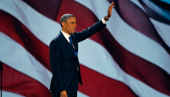 President Obama addresses supporters at his victory rally in Chicago (REUTERS/Jim Bourg)