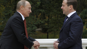 President Putin and Prime Minister Medvedev (REUTERS/Marcos Brindicci)