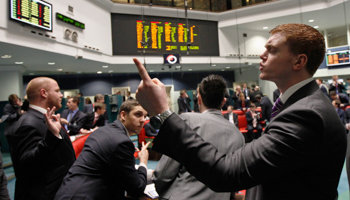 Traders and clerks react at the London Metal Exchange (REUTERS/Luke MacGregor)