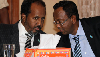 Somalia's president and prime minister confer during the appointment of the cabinet (REUTERS/Omar Faruk)